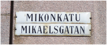 A bilingual Finnish/Swedish street name sign in Helsinki