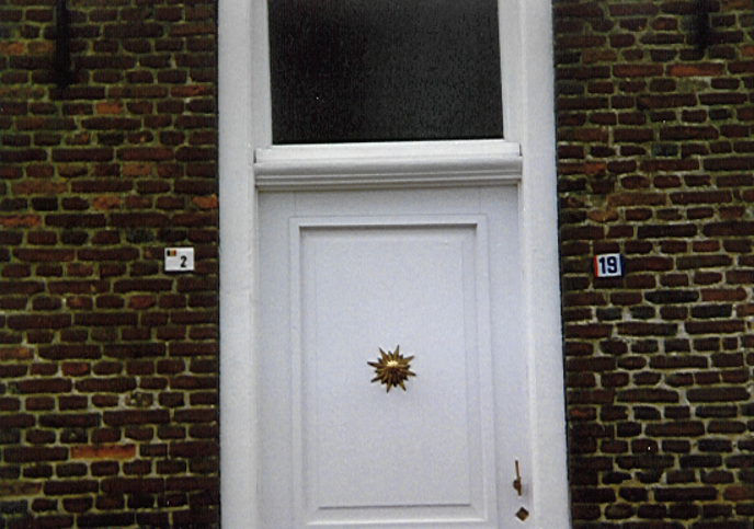 The border between The Netherlands and Belgium runs through the front door of this house, so it has two building numbers